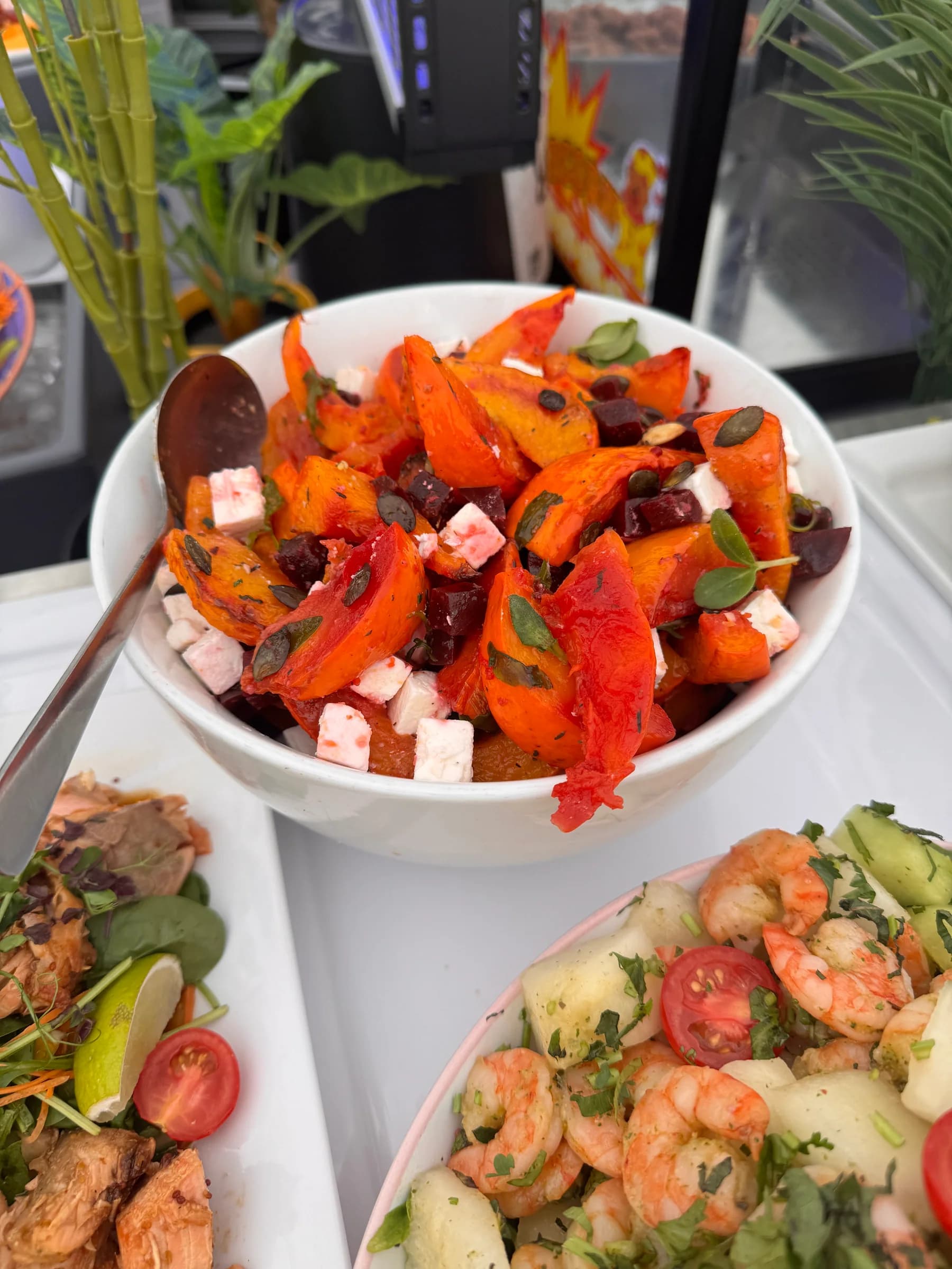Roasted vegetable and feta dish ready for group service