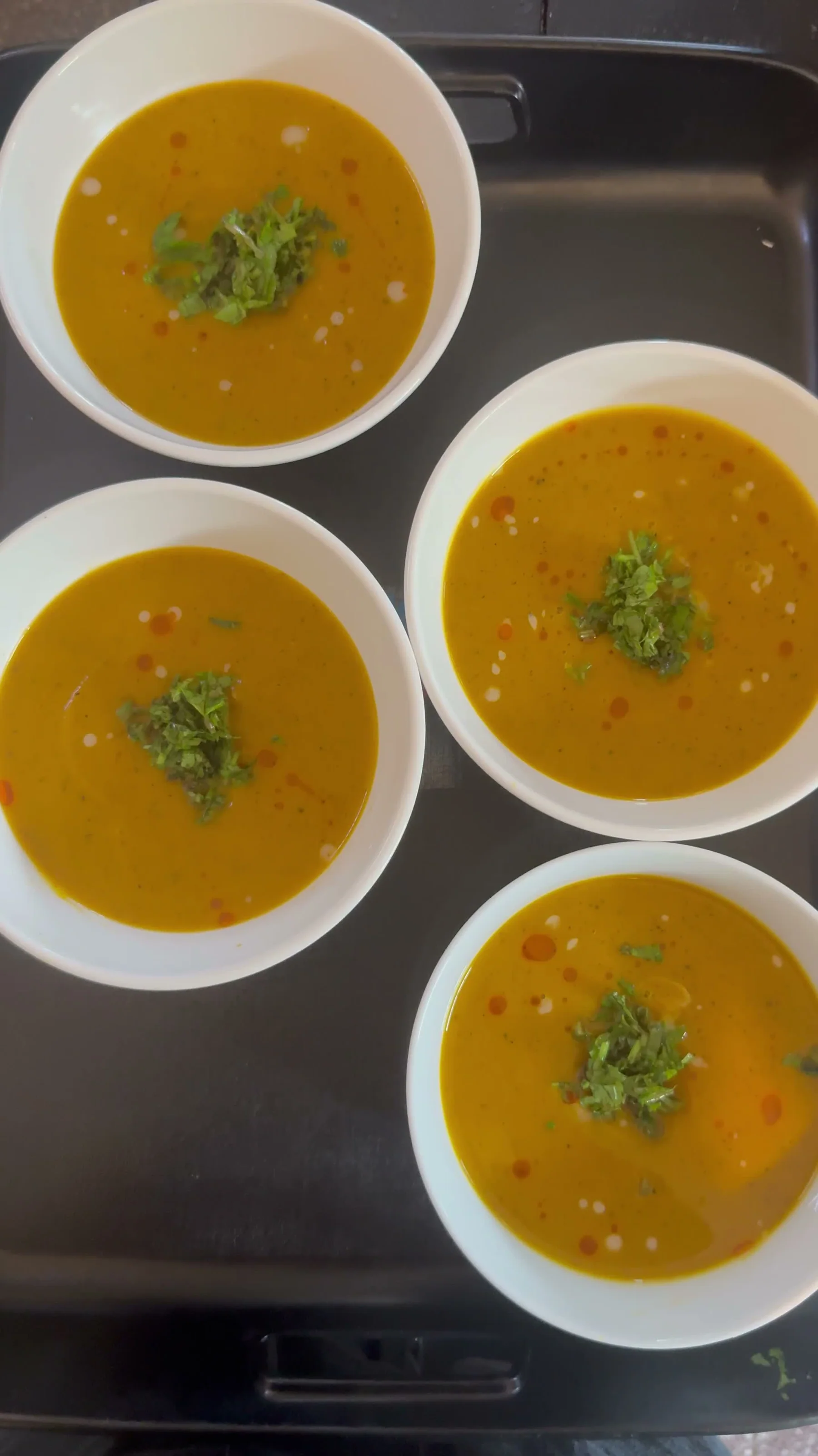 Finished vegetable soup portioned for retreat guests